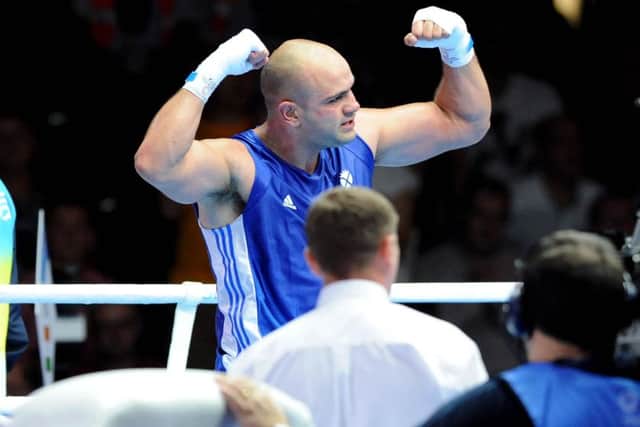 Scotland's Ross Henderson beats Indias Parveen Kurmar. Picture: JP