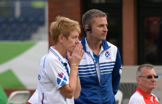 Team Scotland Bowls Manager David Gourley talks to Scotland skip Margaret Letham. Picture: PA