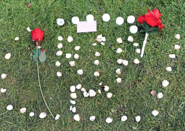 Tributes to Mikaeel Kular in a park near his home in Ferry Gait Cres.  Picture: Ian Rutherford