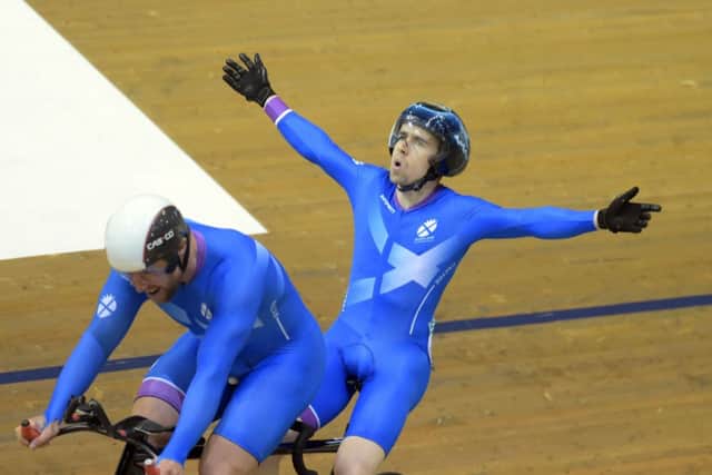 Scotland's Neil Fachie and Craig MacLean celebrate after winning gold in yesterday's final. Picture: PA
