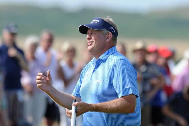 Colin Montgomerie holes his putt on the 8th hole during the third round of the Senior Open Championship. Picture: Getty