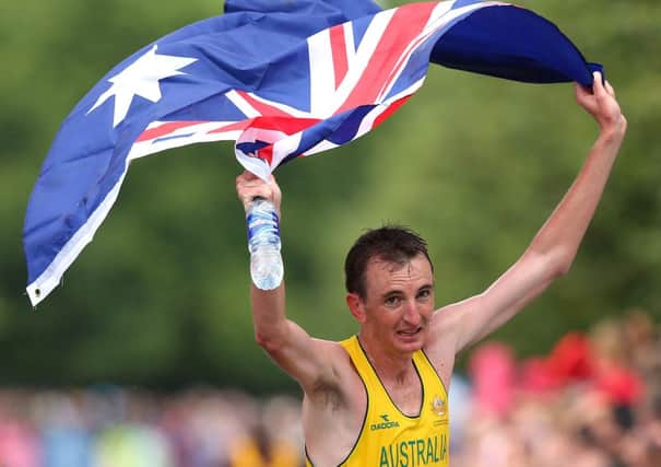 Michael Shelley of Australia celebrates after winning the men's marathon in the Commonwealth Games. Picture: Getty