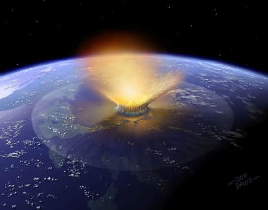 An artists depiction of a huge meteorite striking Earth 65 million years ago. Picture: Reuters