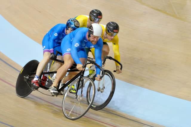 Scotlands Neil Fachie and pilot Craig MacLean take Race 1 of the mens Sprint B Tandem final. Picture: Jane Barlow