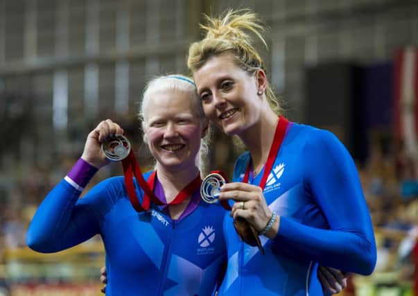 Scotland's Louise Haston and Aileen McGlynn celebrate their silver in the Women's 1km Time Trial B Tandem. Picture: SNS