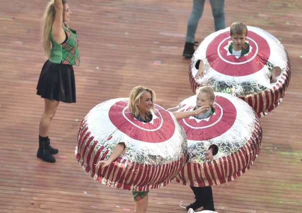 Performers dressed as Tunnocks chocolate teacakes, a renowned Scottish confectionary, perform during the opening ceremony of the 2014 Commonwealth Games. Picture: Getty