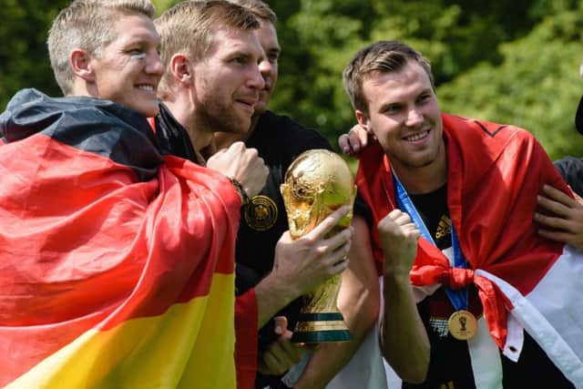 Bastian Schweinsteiger celebrates with his Germany team mates including  Kevin Grosskreutz, a Dortmund player. Picture: Getty