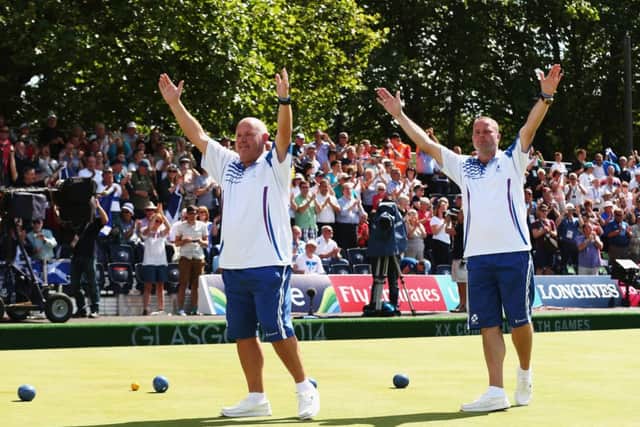 Alex Marshall and Paul Foster of Scotland celebrate after winning gold in the Men's Pairs Final at Kelvingrove Lawn Bowls Centre. Picture: Getty