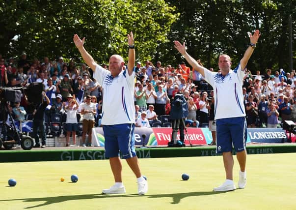 Alex Marshall and Paul Foster of Scotland celebrate after winning gold in the Men's Pairs Final at Kelvingrove Lawn Bowls Centre. Picture: Getty