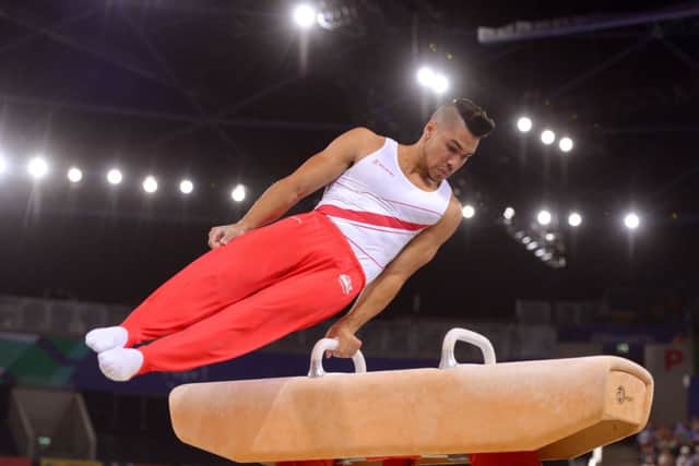 England's Louis Smith competes on the Pommel Horse during the Men's Team Final and Individual Qualification at the SEE Hydro. Picture: PA