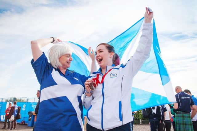 Scotlands Jen McIntosh celebrates with her mum Shirley who presented her with her medal. Picture: Paul Reid