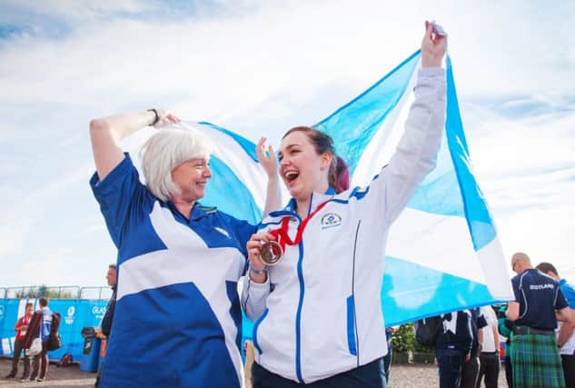Scotlands Jen McIntosh celebrates with her mum Shirley who presented her with her medal. Picture: Paul Reid