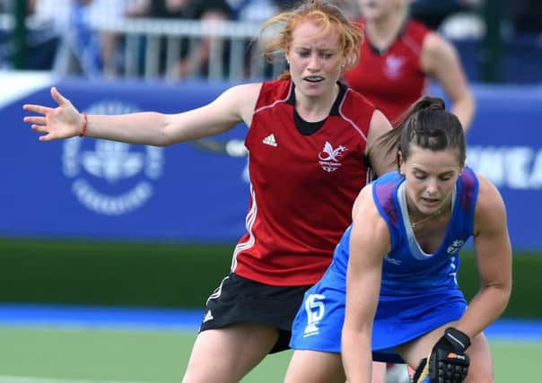Scotlands Leigh Fawcett steers the ball away from Sarah Jones. PicturE: Lisa Ferguson