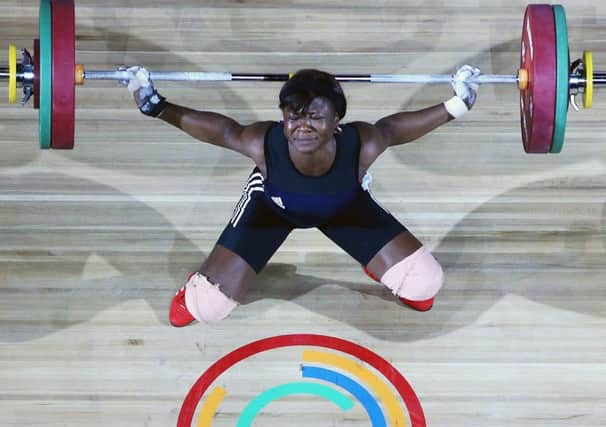 Itohan Ebireguesele of Nigeria strains every sinew on her way to the silver medal. Picture: Getty