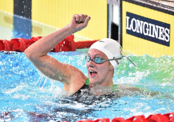 Jazz Carlin celebrates becoming the first Welsh woman since 1974 to win a swimming gold. Picture: Ian Rutherford