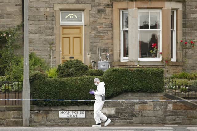 Police forensic units pictured at Morningside Grove. Picture: Scott Louden