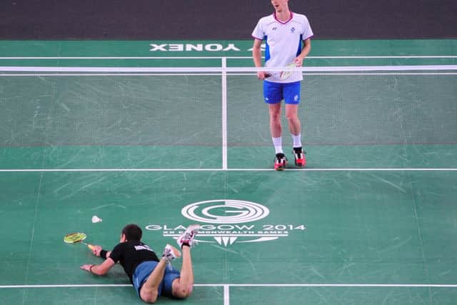 Cribb dives on match point but can't return the shuttlecock. Picture: Ian Rutherford