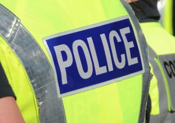 Police said a 17-year-old man has been arrested in connection with an alleged assault on an elderly woman within her home. Picture: TSPL