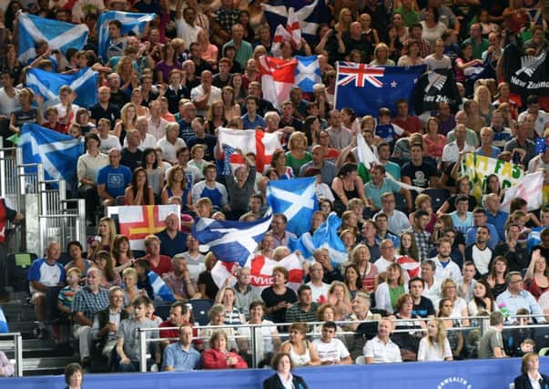 A female spectators was ejected from the Tollcross Swimming International Centre in Glasgow after waving a Saltire with 'Yes' emblazoned on it. Picture: Lisa Ferguson