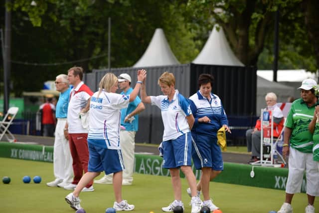 Scotland Skip Margaret Latham congratulates Claire Johnston. Picture: TSPL