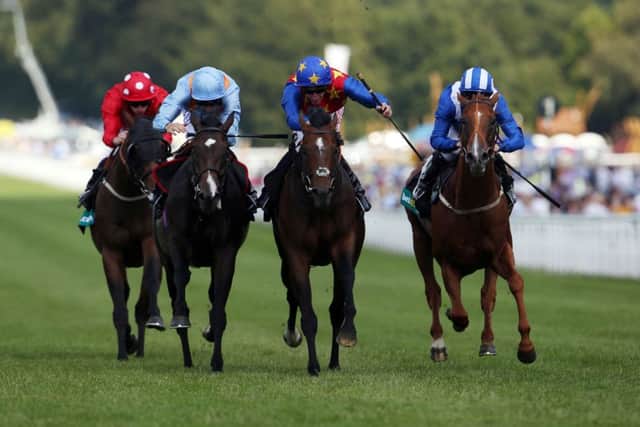 Es Que Love, ridden by Adam Kirby, wins the bet365 Lennox Stakes on the opening day of Goodwood. Picture: PA
