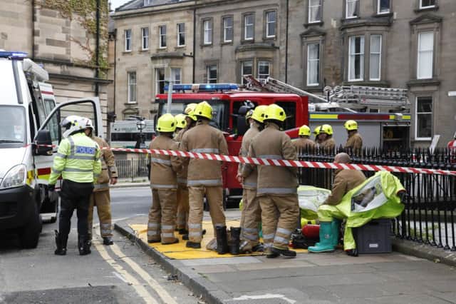 Emergency services attend the scene on Palmerston Place. Picture: Scott Louden