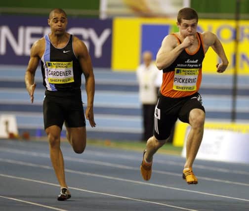 Craig Pickering  (R) leads Jason Gardener in the mens 60m. Picture: Getty