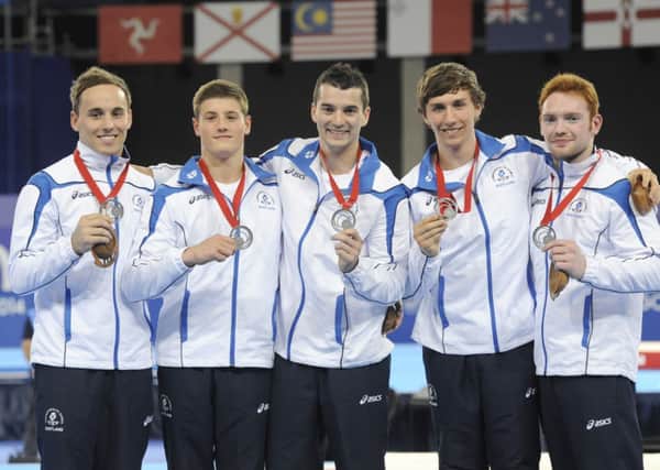 Daniel Keatings, Frank Baines, Adam Cox, Liam Davie, Daniel Purvis with their silver medals. Picture: Greg Macvean