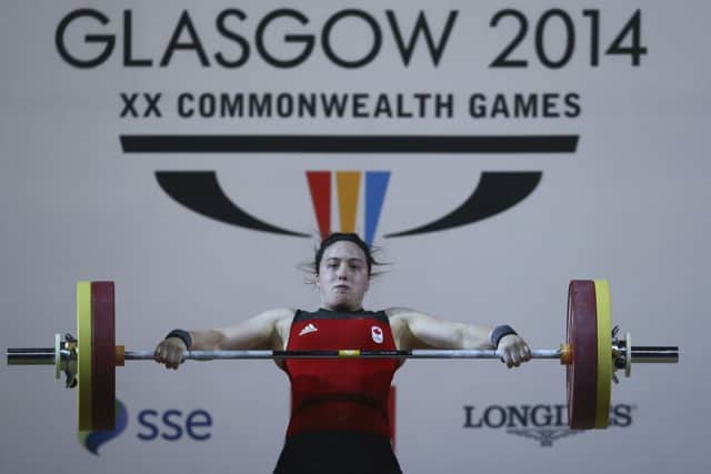 Marie-Eve Beauchemin-Madeau of Canada competes during the Women's 75kg Weightlifting Finals at the SECC. Picture: Getty