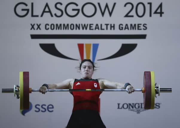 Marie-Eve Beauchemin-Madeau of Canada competes during the Women's 75kg Weightlifting Finals at the SECC. Picture: Getty
