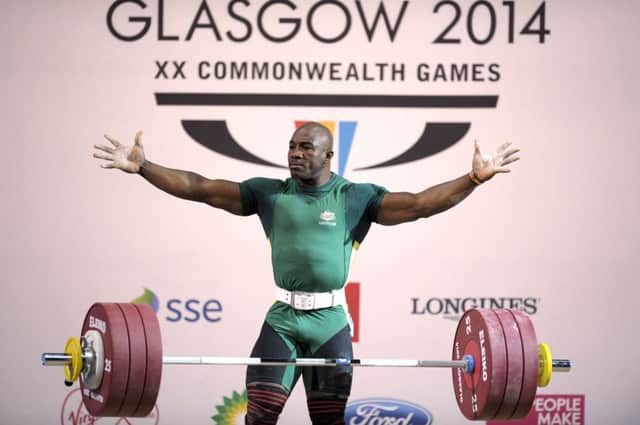 Simplice Ribouem of Australia competes in the Men's 94kg weightlifting final. Picture: Getty