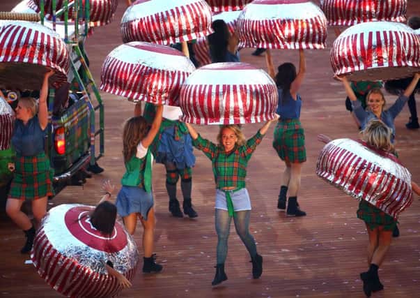 Dancers perform with the teacake props during the Opening Ceremony for the Glasgow 2014 Commonwealth Games. Picture: Getty