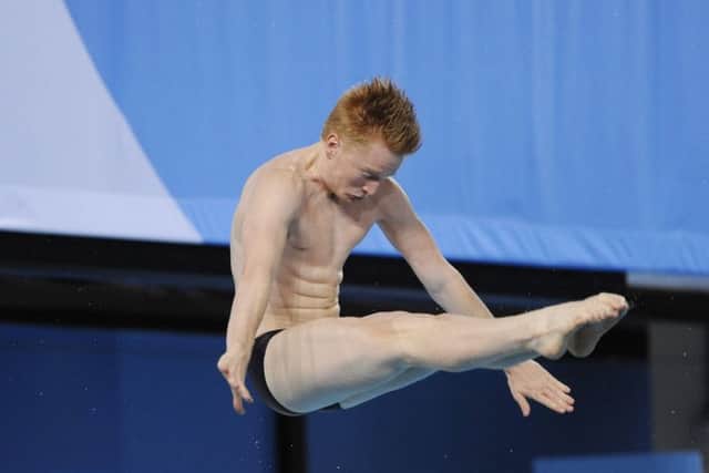 James Heatly takes the plunge at the Commonwealth Pool. Picture: Greg Macvean