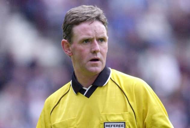 Hugh Dallas pictured refereeing a match between Hibs and Hearts in May 2000. Picture: TSPL