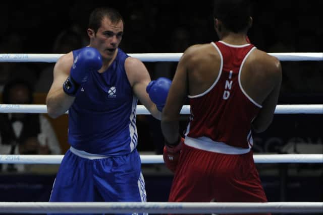 Scotland's Stephen Lavelle beats Indian opponent Amritpreet Singh Amritpreet in the men's heavyweight category. Picture: Andrew O'Brien