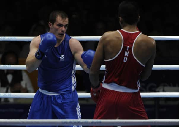 Scotland's Stephen Lavelle beats Indian opponent Amritpreet Singh Amritpreet in the men's heavyweight category. Picture: Andrew O'Brien
