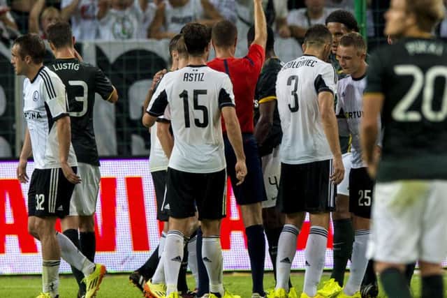 Celtic's Efe Ambrose was given his marching orders in the first half. Picture: SNS