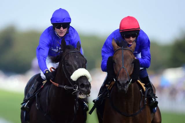 Cavalryman, left, ridden by Kieren Fallon, wins the Artemis Goodwood Cup ahead of  Ahzeemah. Picture: PA