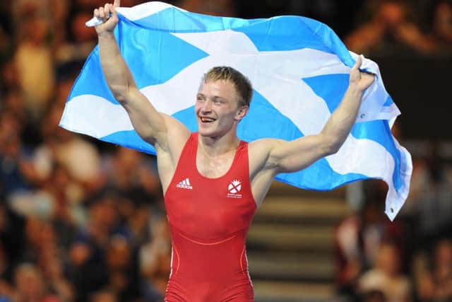 Alex Gladkov celebrates after defeating Chamara Perera of Sri Lanka. Picture: Neil Hanna
