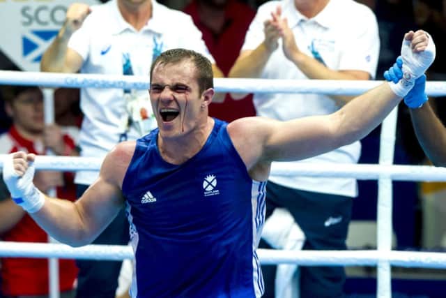 Scotland's Stephen Lavelle celebrates after beating Kody Davies. Picture: SNS