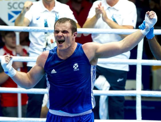Scotland's Stephen Lavelle celebrates after beating Kody Davies. Picture: SNS