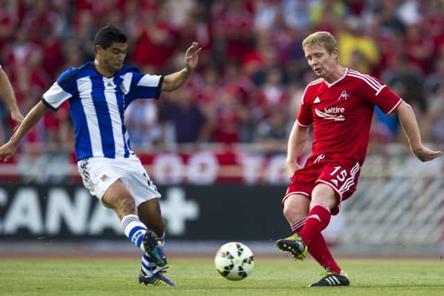 Barry Robson duels for the ball with Chori Castro of Real Sociedad. Picture: Getty