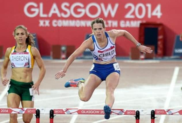 Scotlands Eilidh Child clears a hurdle in the home straight at Hampden on her way to claiming the silver medal. Picture: Jane Barlow
