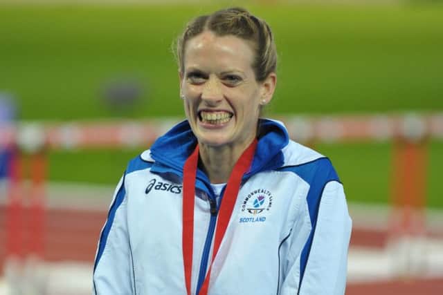 Eilidh Child grins broadly after winning a silver last night. Picture: Jane Barlow