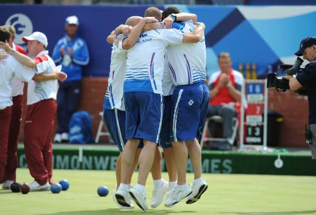 Scotland's bowlers celebrate victory over England. Picture: Neil Hanna