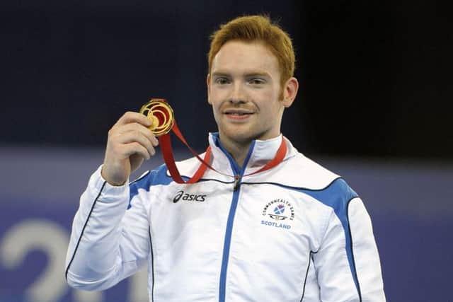 Daniel Purvis of Scotland wins parallel bars gold. Picture: John Devlin