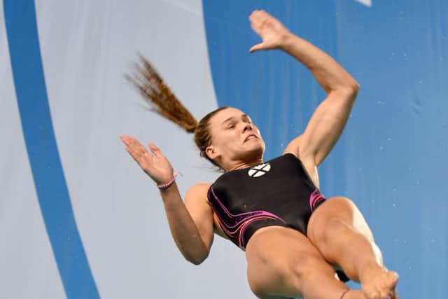 Scotlands teenage diving star Grace Reid in action , where she had no idea she was in second place before her final dive in the onemetre springboard.  Picture: Jane Barlow