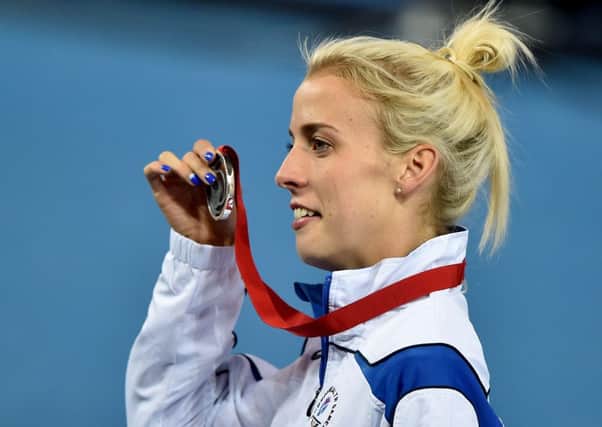 Lynsey Sharp celebrates with her silver medal. Picture: Ian Rutherford