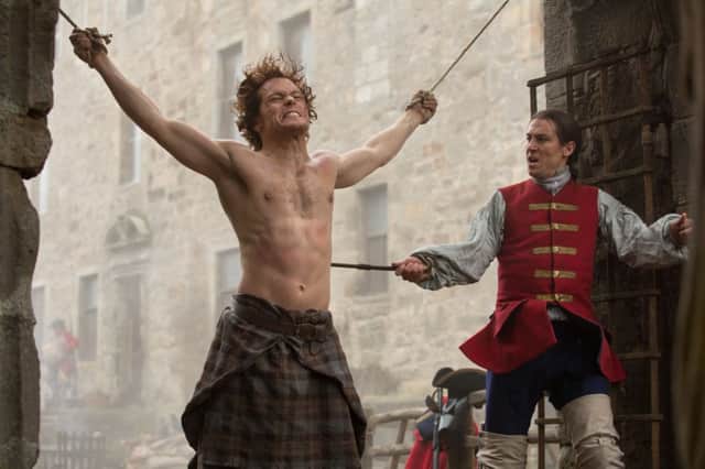 Sam Heughan stars as Jamie Fraser while Tobias Menzies (right) plays Black Jack Randall. Picture: Contributed