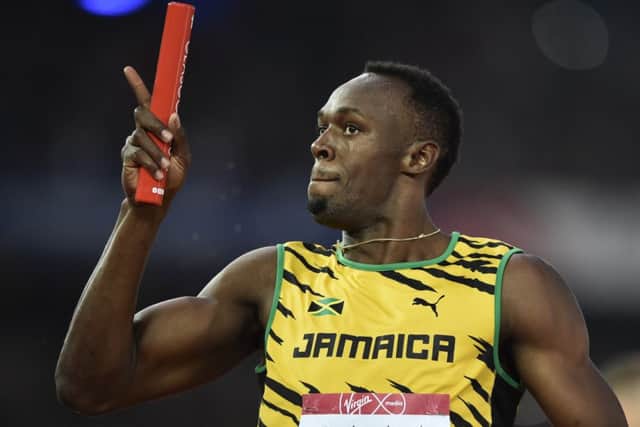 Usain Bolt wins the final of the men's 4 x 100m relay at Hampden. Picture: AFP/Getty
